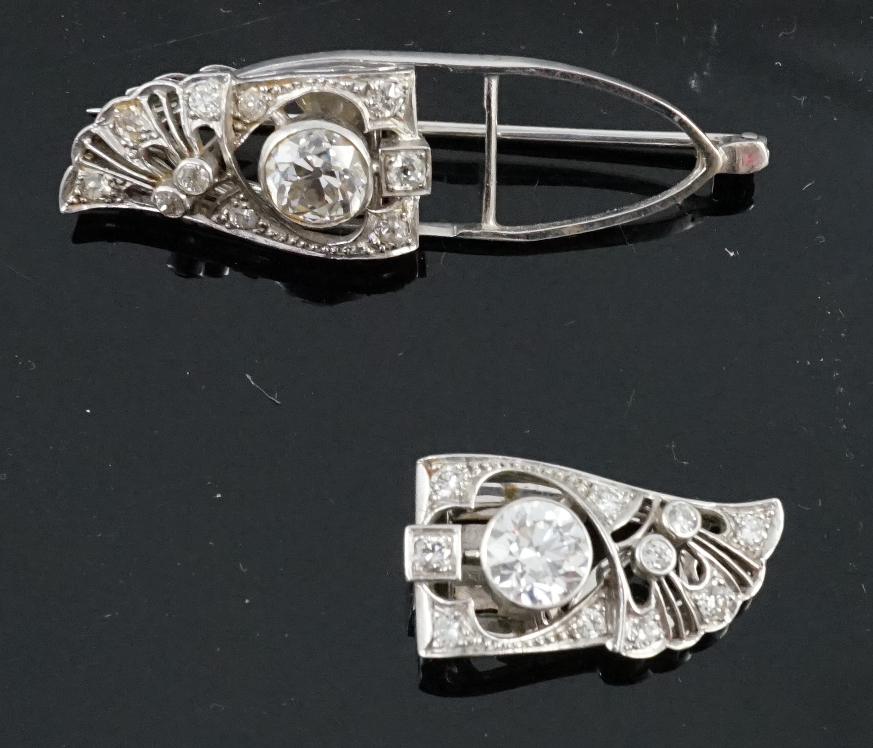 A good Art Deco platinum and diamond cluster set double clip brooch